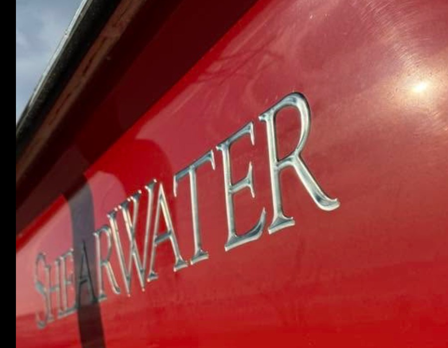 Red Shearwater boat hull during marine restoration